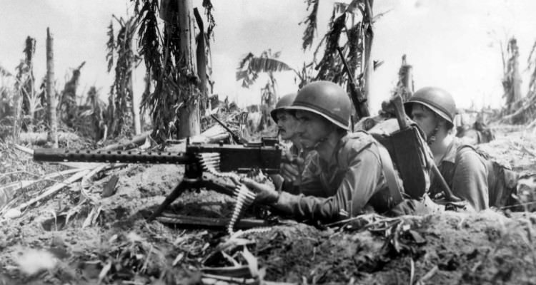 Three_Marines_and_their_machine_gun_on_Guam
